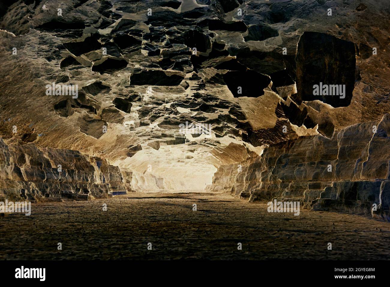 Flat cave floor with park rocks on ceiling Stock Photo Alamy