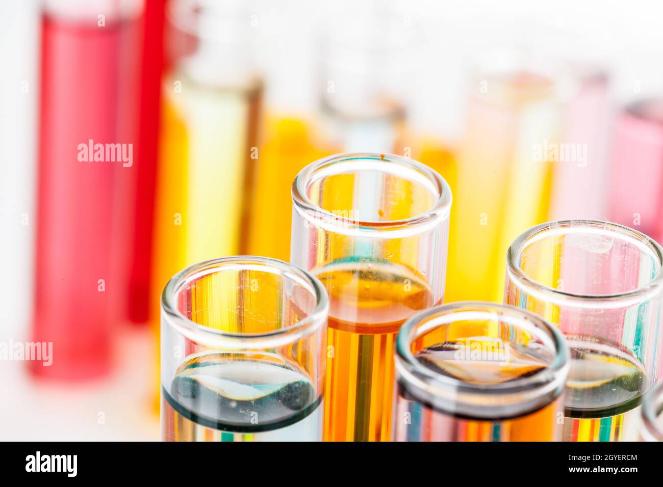 Test tubes with colorful chemicals close up in laboratory Stock Photo ...