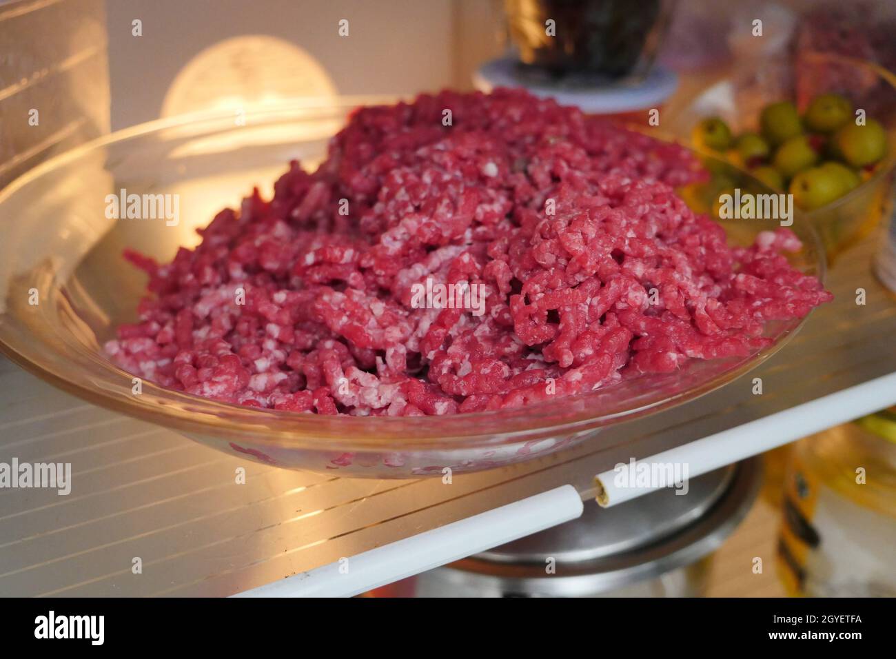 ground beef, freshly ground in the refrigerator Stock Photo Alamy
