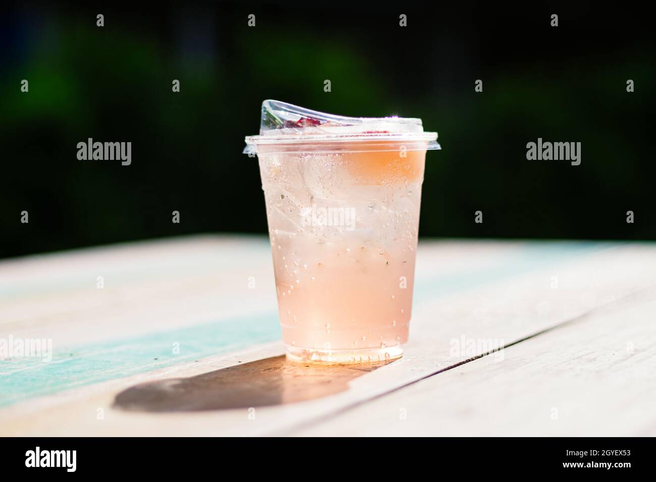 Fresh summer soft drink mocktail pour in recycle Bio plastic glass Stock Photo Alamy