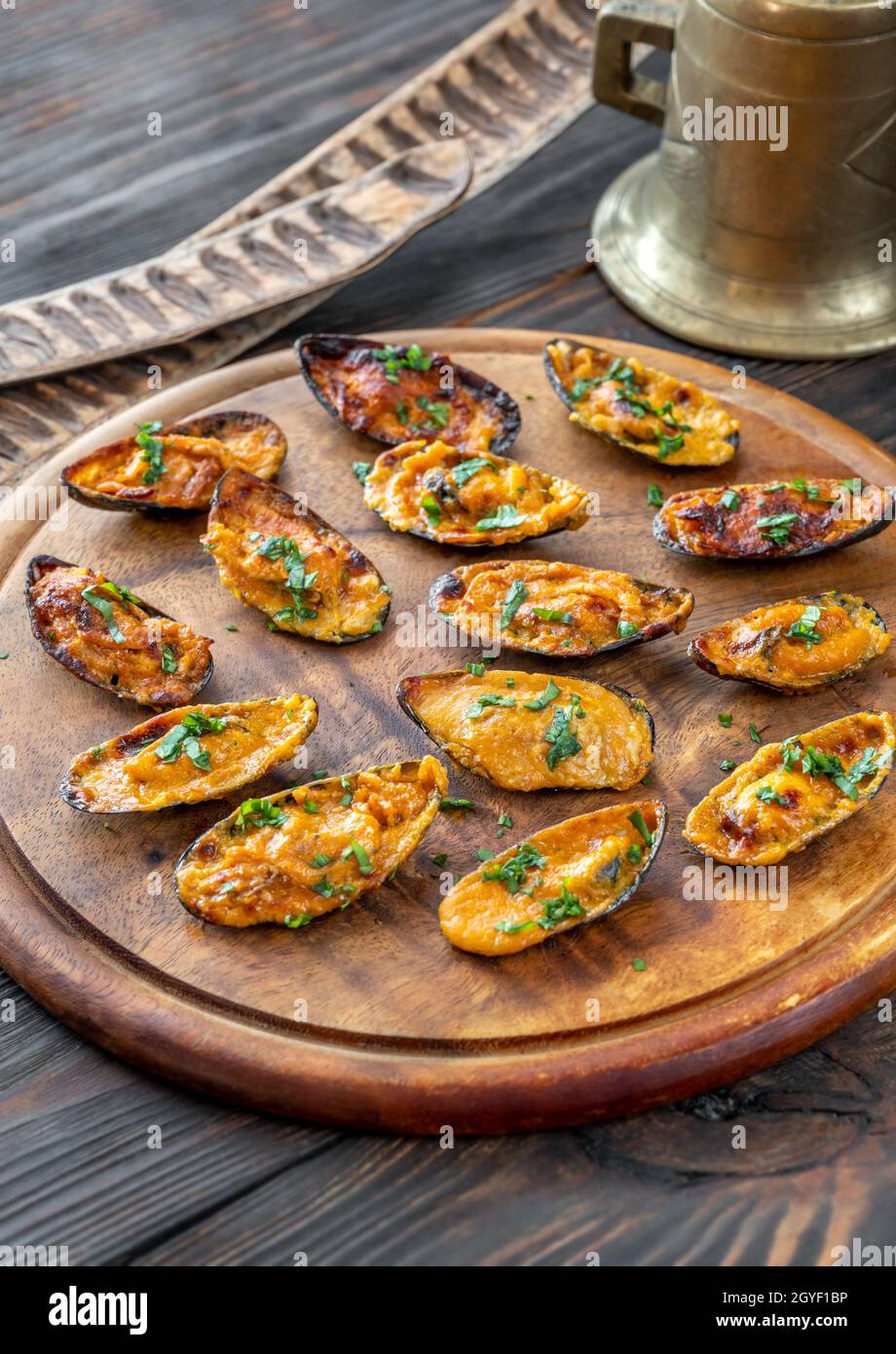 Baked mussels stuffed with cheddar cheese sauce Stock Photo Alamy