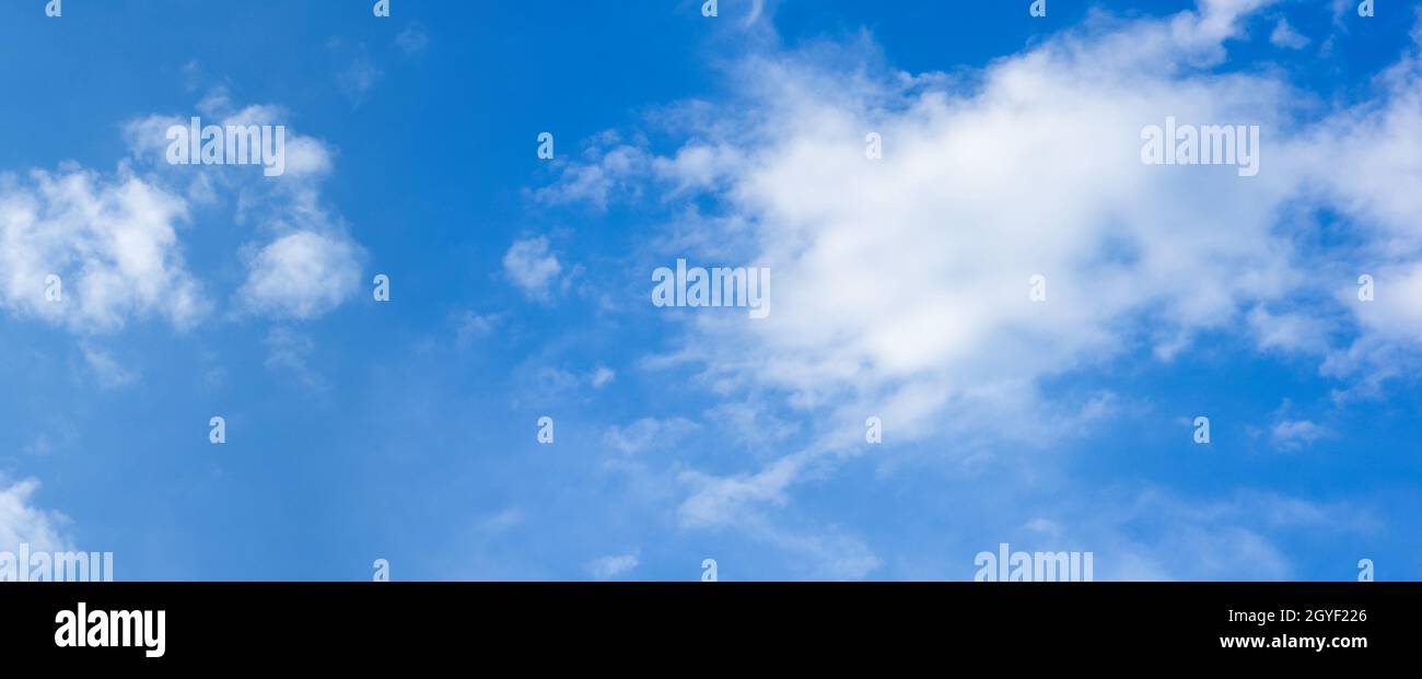 Blue sky background with white clouds. Panorama Stock Photo - Alamy