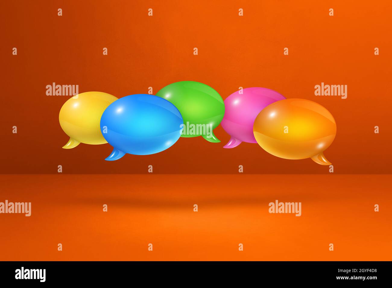 3D multicolor speech bubbles isolated on orange background Stock Photo