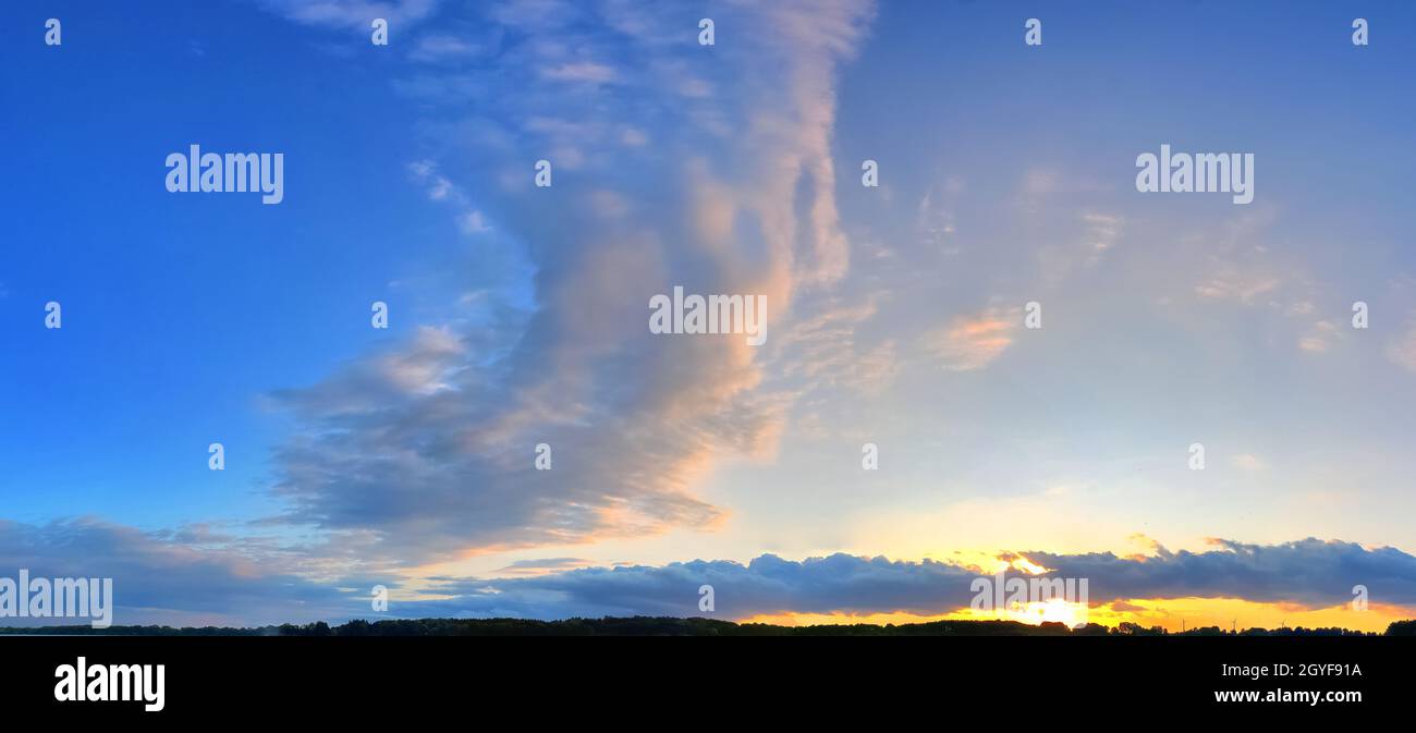 Stunning colorful sky panorama showing beautiful cloud formations in ...