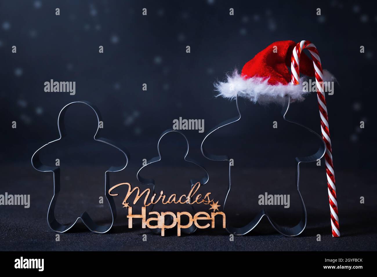Christmas Cookie Cutters In Shape Of Gingerbread Mans. Happy Family Holidays Concept Stock Photo - Alamy