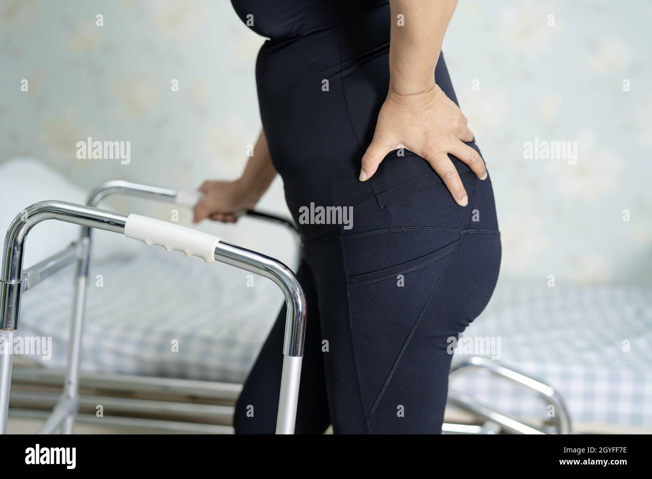 Premium Photo  Asian lady patient wearing back pain support belt for  orthopedic lumbar.
