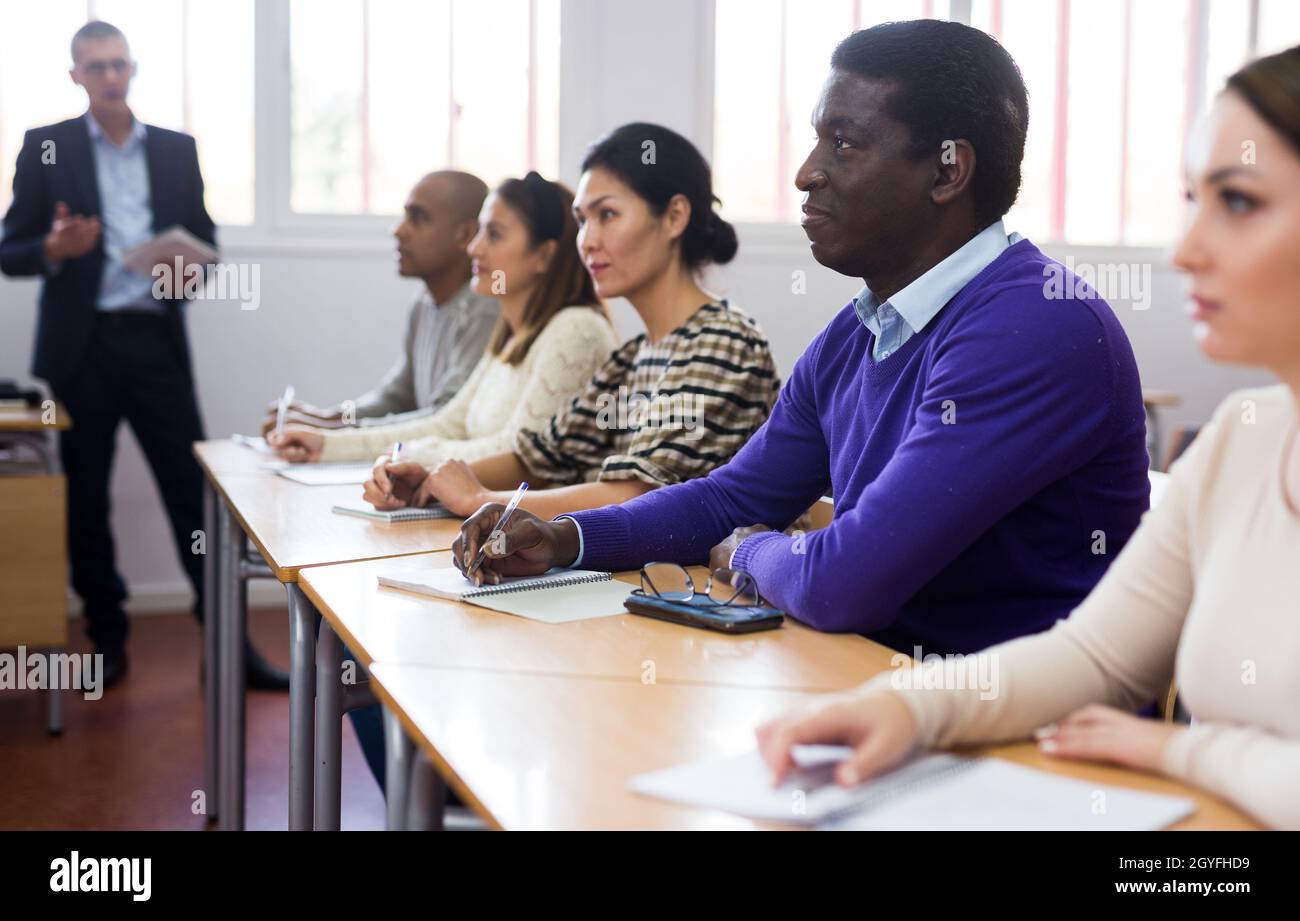 African-american student among students in classroom Stock Photo - Alamy