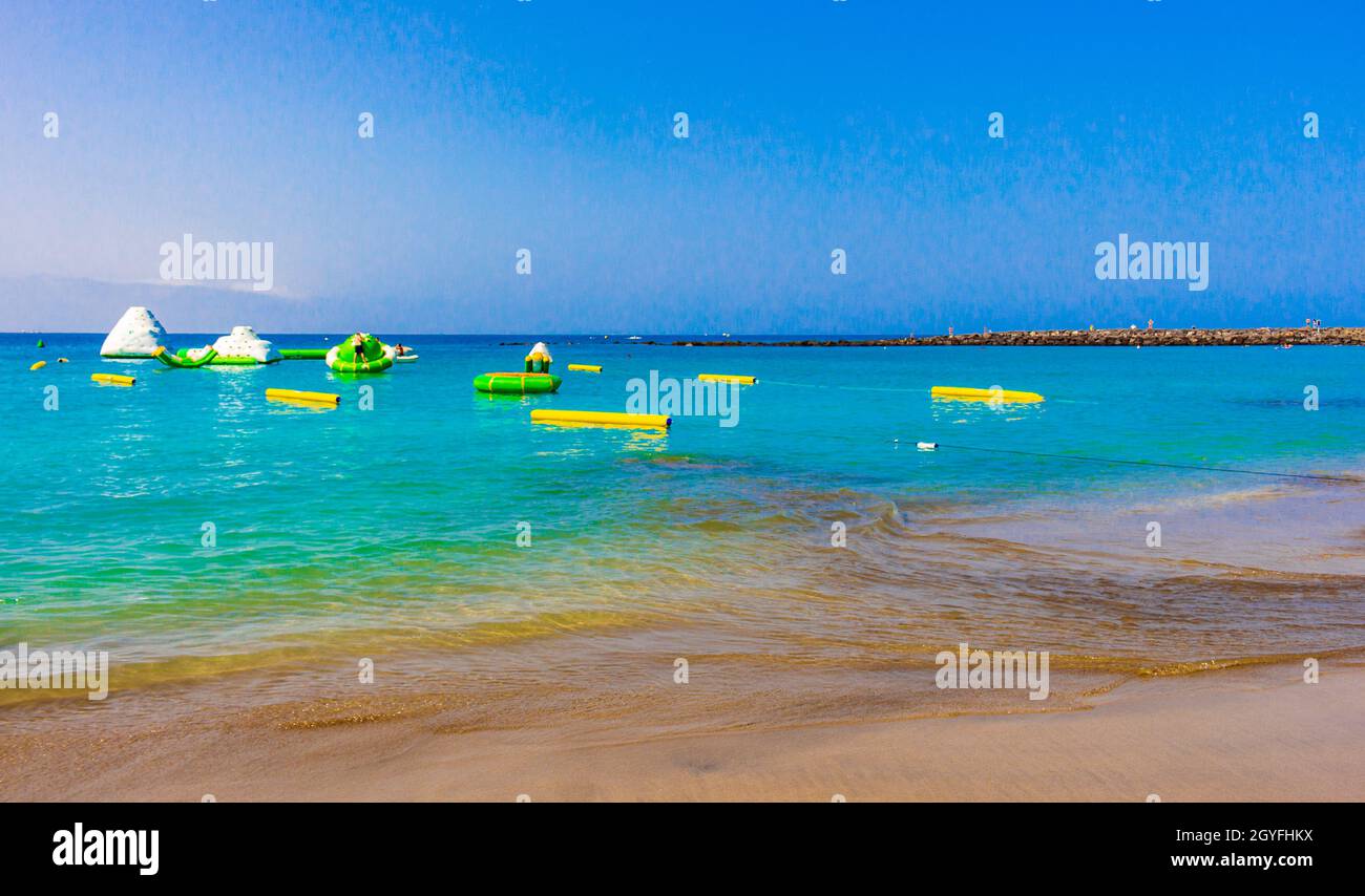 Landscape and beach promenade panorama of Playa de Las Vistas of Canary Spanish island Tenerife