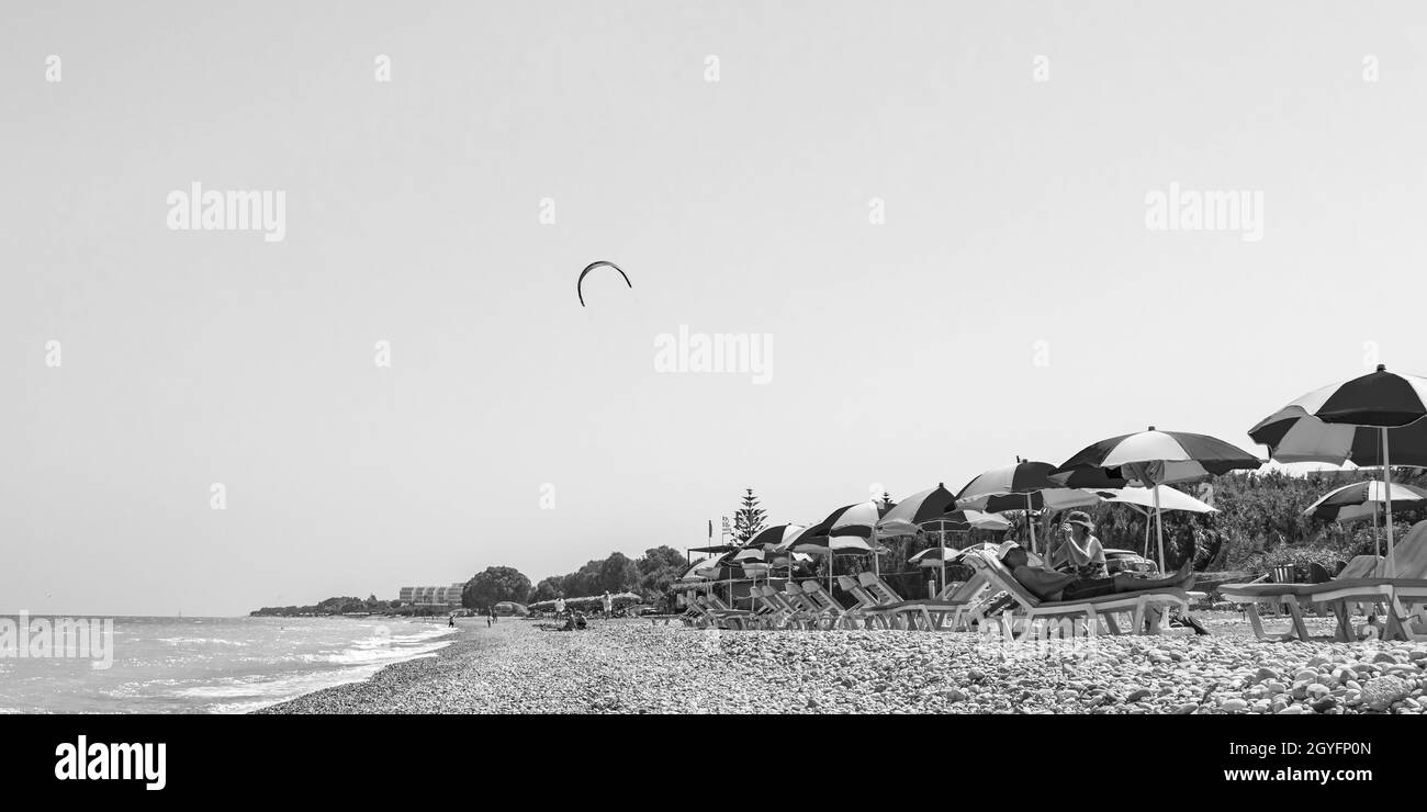 Rhodes Greece 20. September 2018 Black and white picture of windsurfing and vacation in Rhodes Greece with clear waters of Ialysos beach. Stock Photo