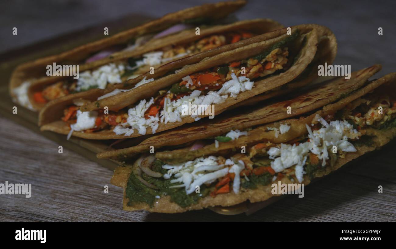 Paratha can be plain or stuffed. The paratha is mainly made up of maida or wheat flour.This paratha has veggies puree. Stock Photo