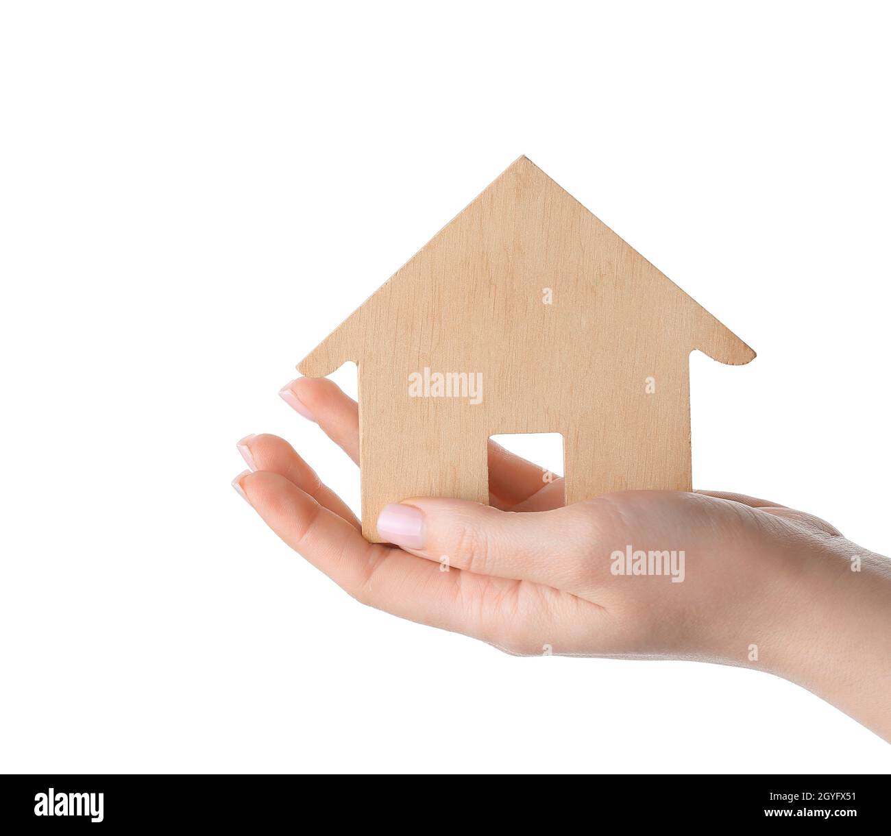 Woman with wooden house on white background Stock Photo - Alamy