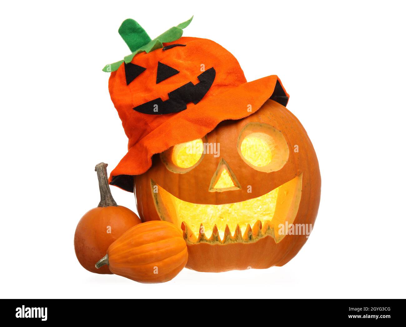 Carved and whole pumpkins for Halloween on white background Stock Photo ...