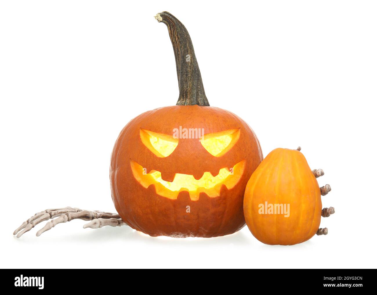 Carved and whole pumpkins for Halloween on white background Stock Photo ...
