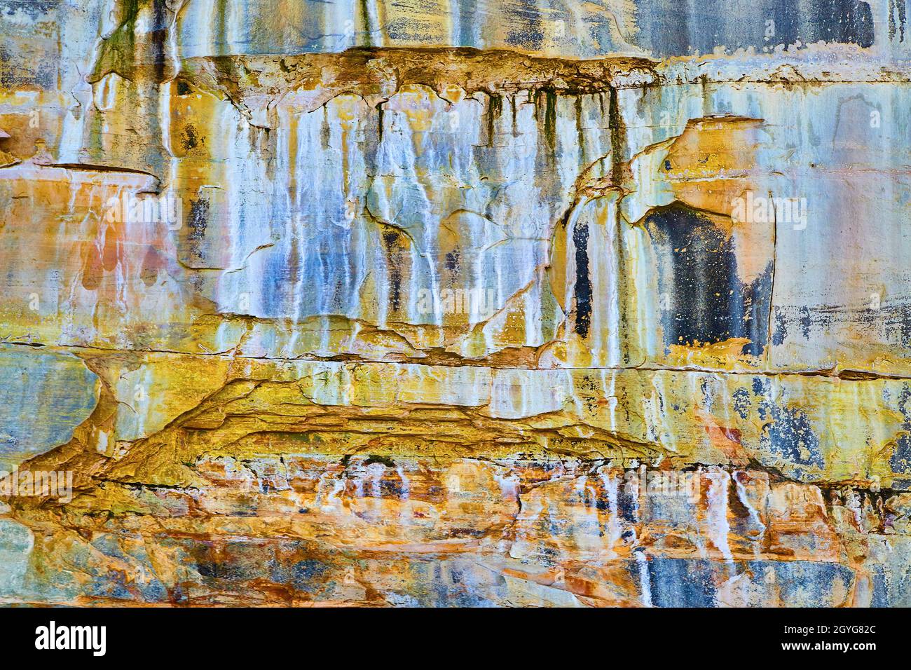 Smeared Rocks Pictured Rocks with their surface that looks paint smeared Stock Photo ...