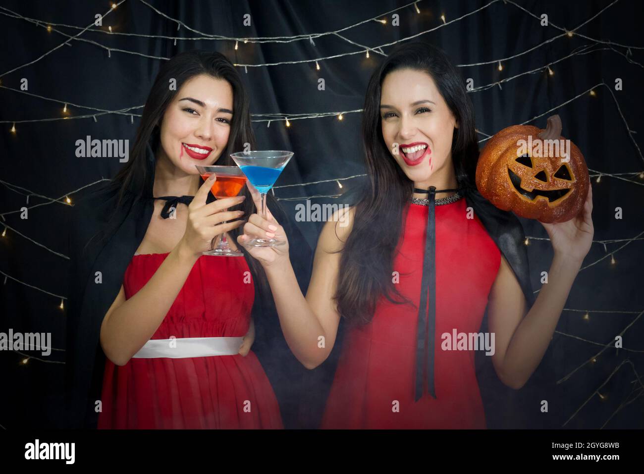 Woman red dress devil hi-res stock photography and images - Alamy