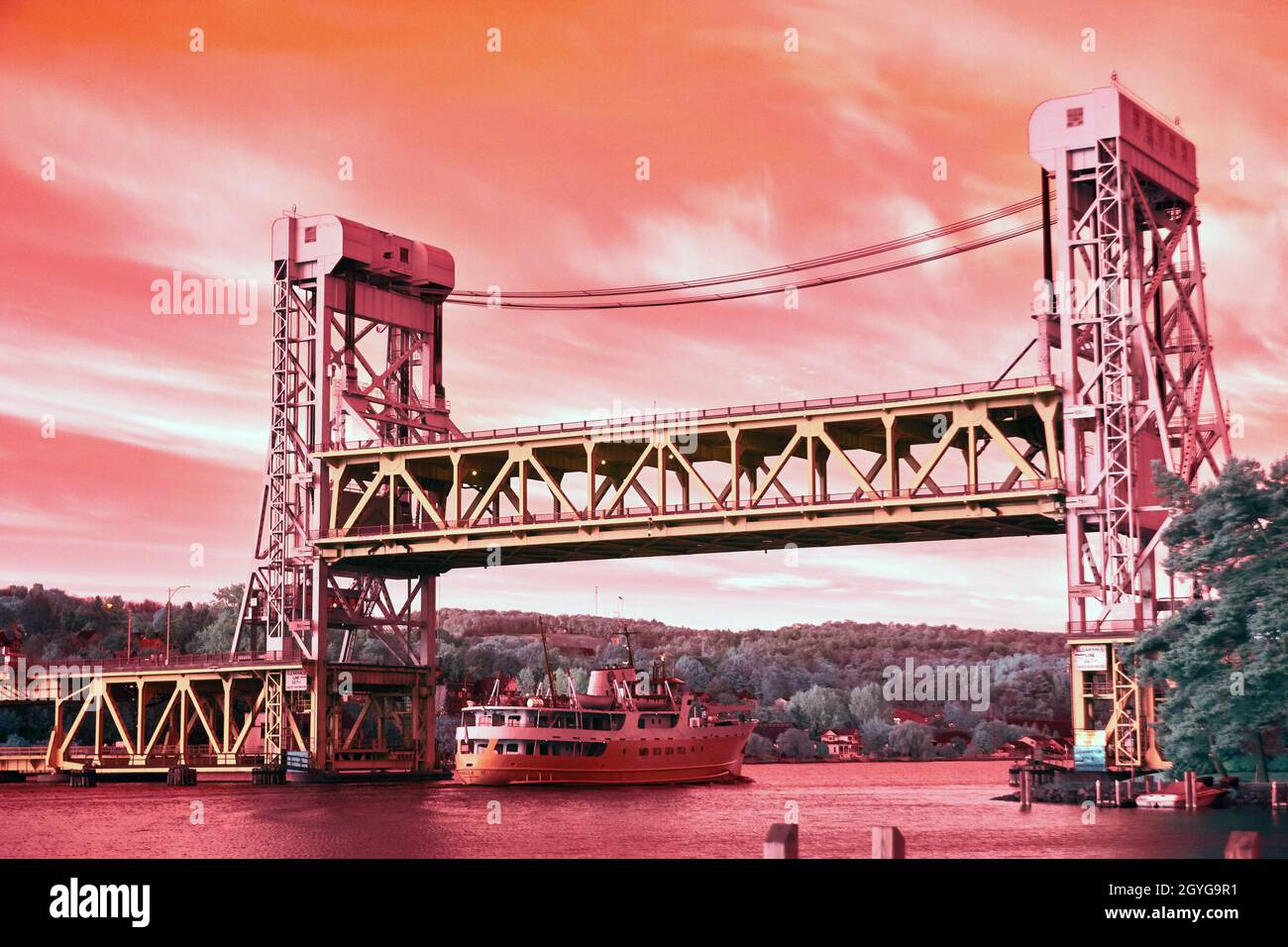 Infrared of Houghton lift bride with passenger river ship passing under the bridge Stock Photo