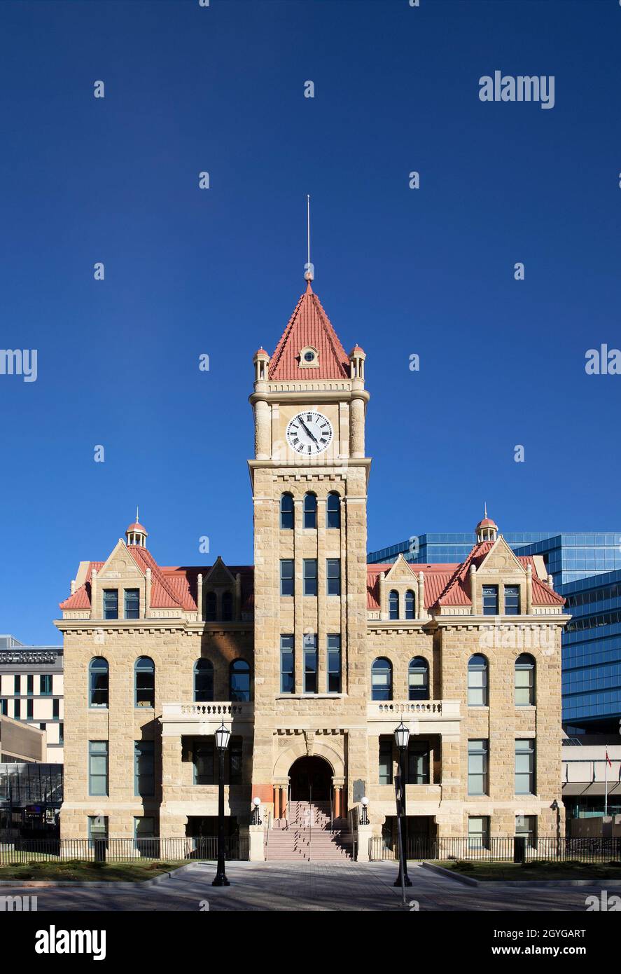 Calgary city hall with clock tower, a 1911 building made of Paskapoo sandstone, rehabilitated in 2020. It has been designated a National Historic Site Stock Photo