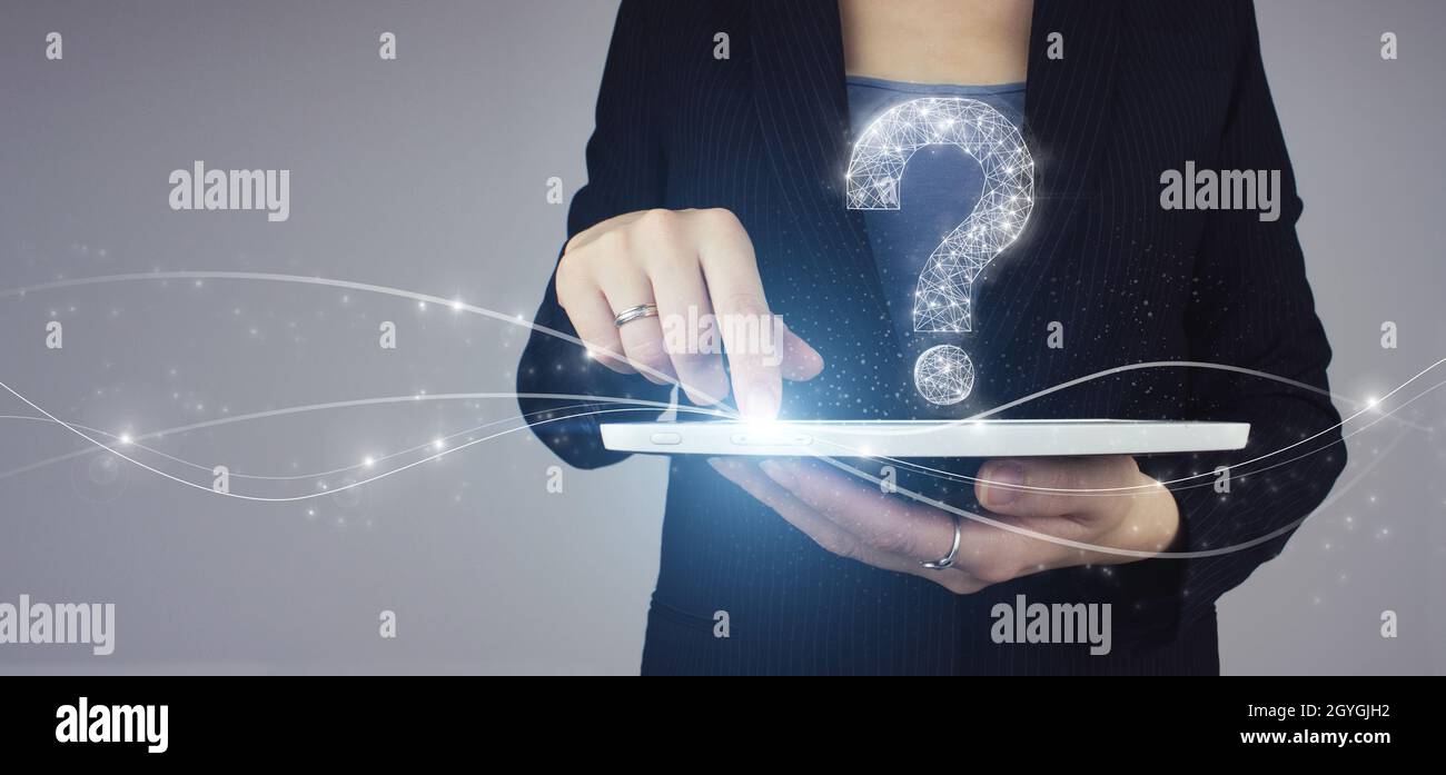FAQ frequently asked questions concept. White tablet in businesswoman ...