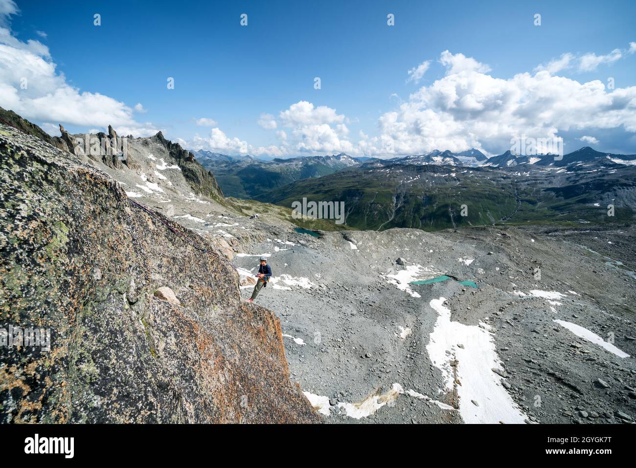 Rock climbing at Descending Hannibalturm near Furkapass, Switzerland Stock Photo