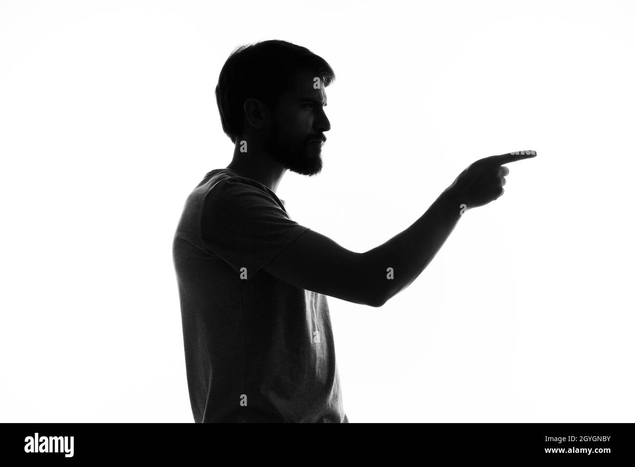 silhouette of a man gestures with his hands black and white photo Stock ...