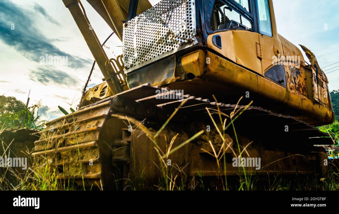 Old rusty excavator wreck in the junkyard Stock Photo Alamy