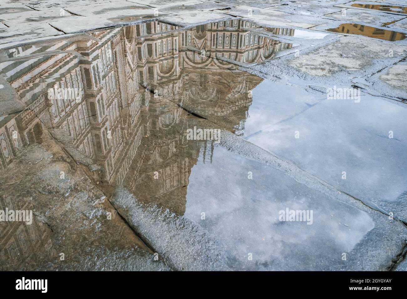 Florence's cathedral reflected in a puddle Stock Photo