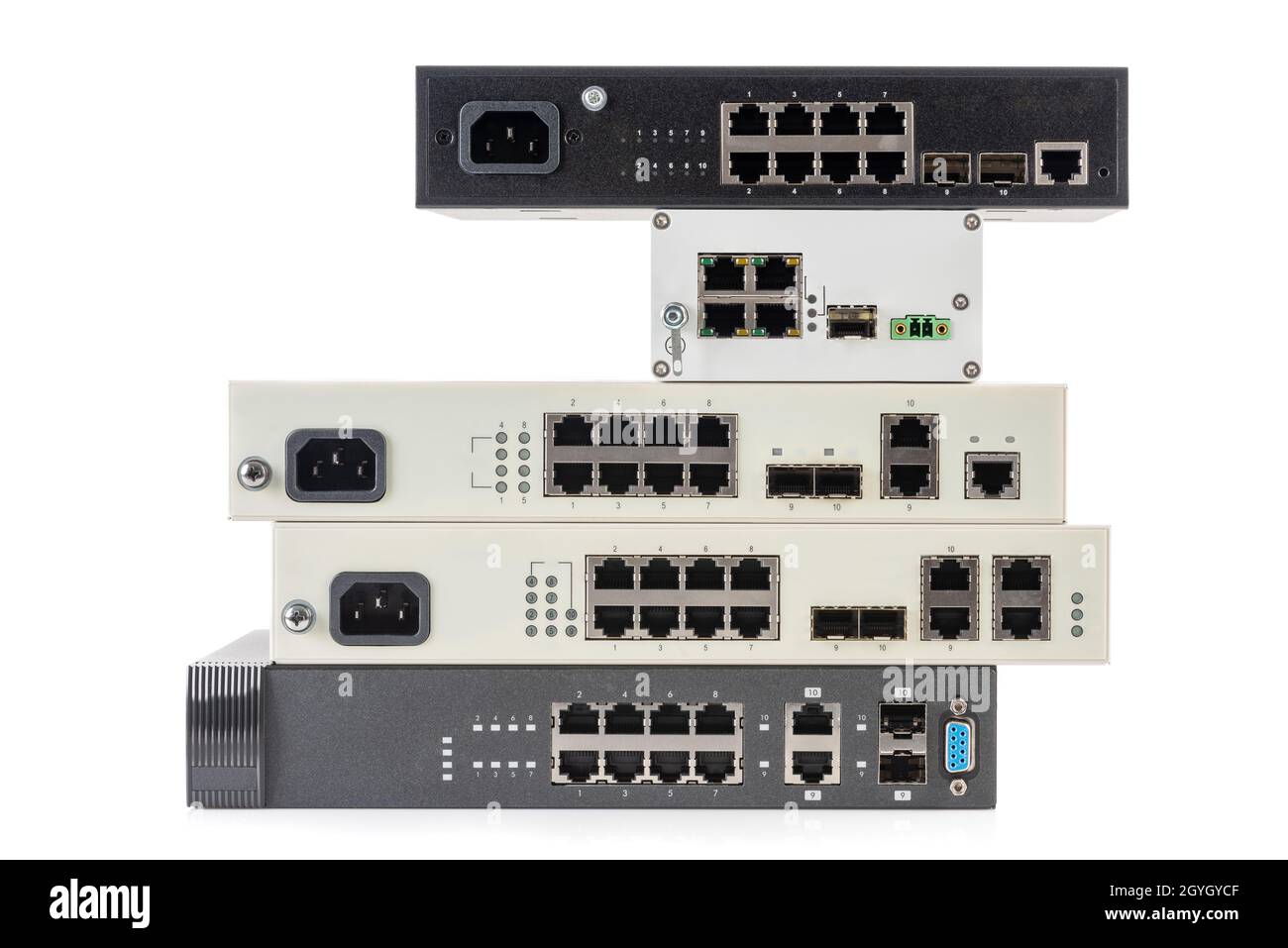 Pile of network ethernet gigabit switches isolated on white background Stock Photo