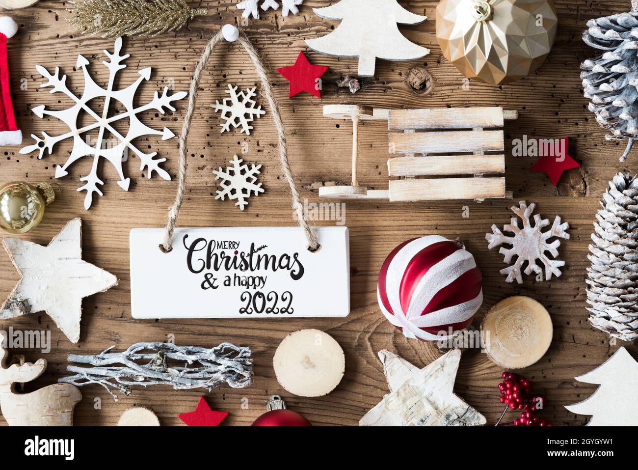 Wooden Christmas Decoration, Sign, Merry Christmas And A Happy 2022 Stock Photo - Alamy