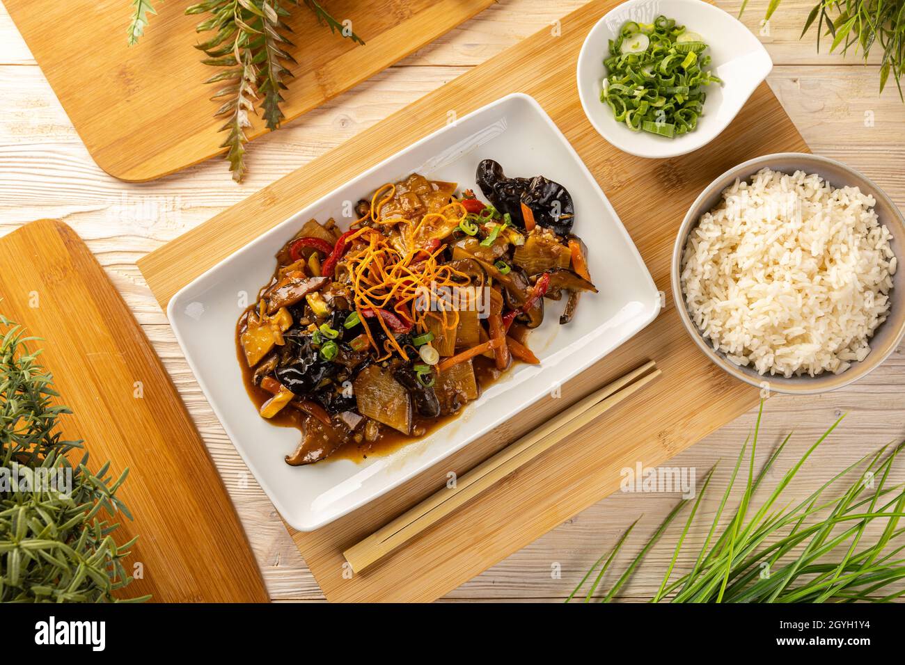 Top view of noodles stir fry with ear wood mushrooms and bamboo shoots