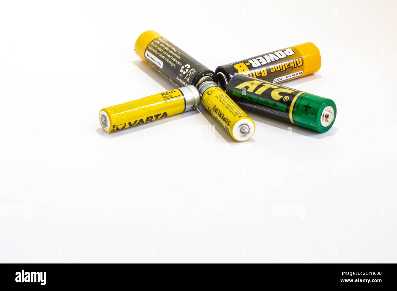 Five used old batteries on a white background,isolated Stock Photo