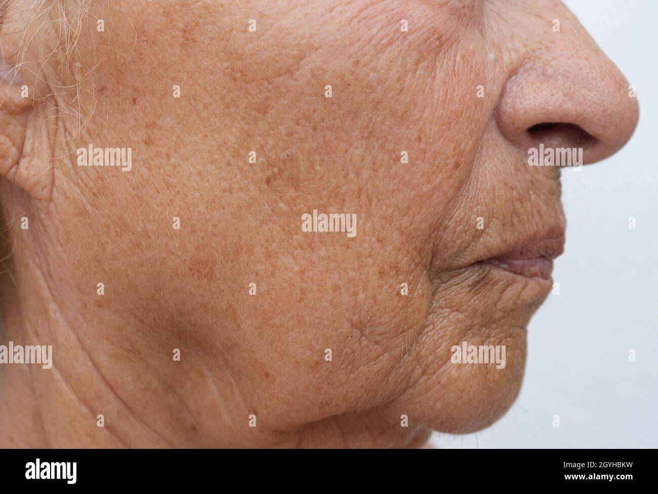 Elderly man's hand on white background Stock Photo