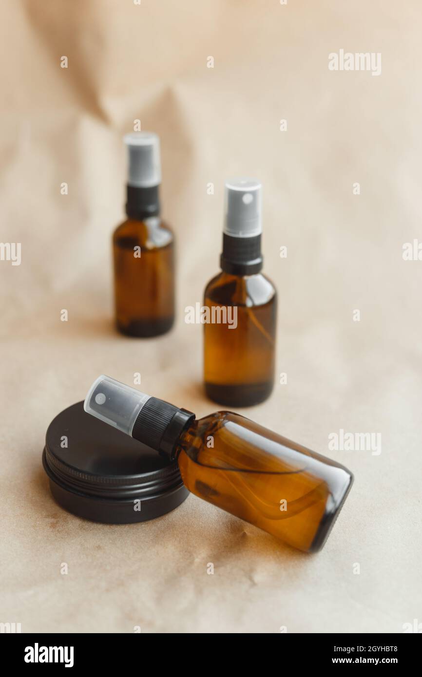 Set of amber bottles for essential oils and cosmetics. Glass bottle