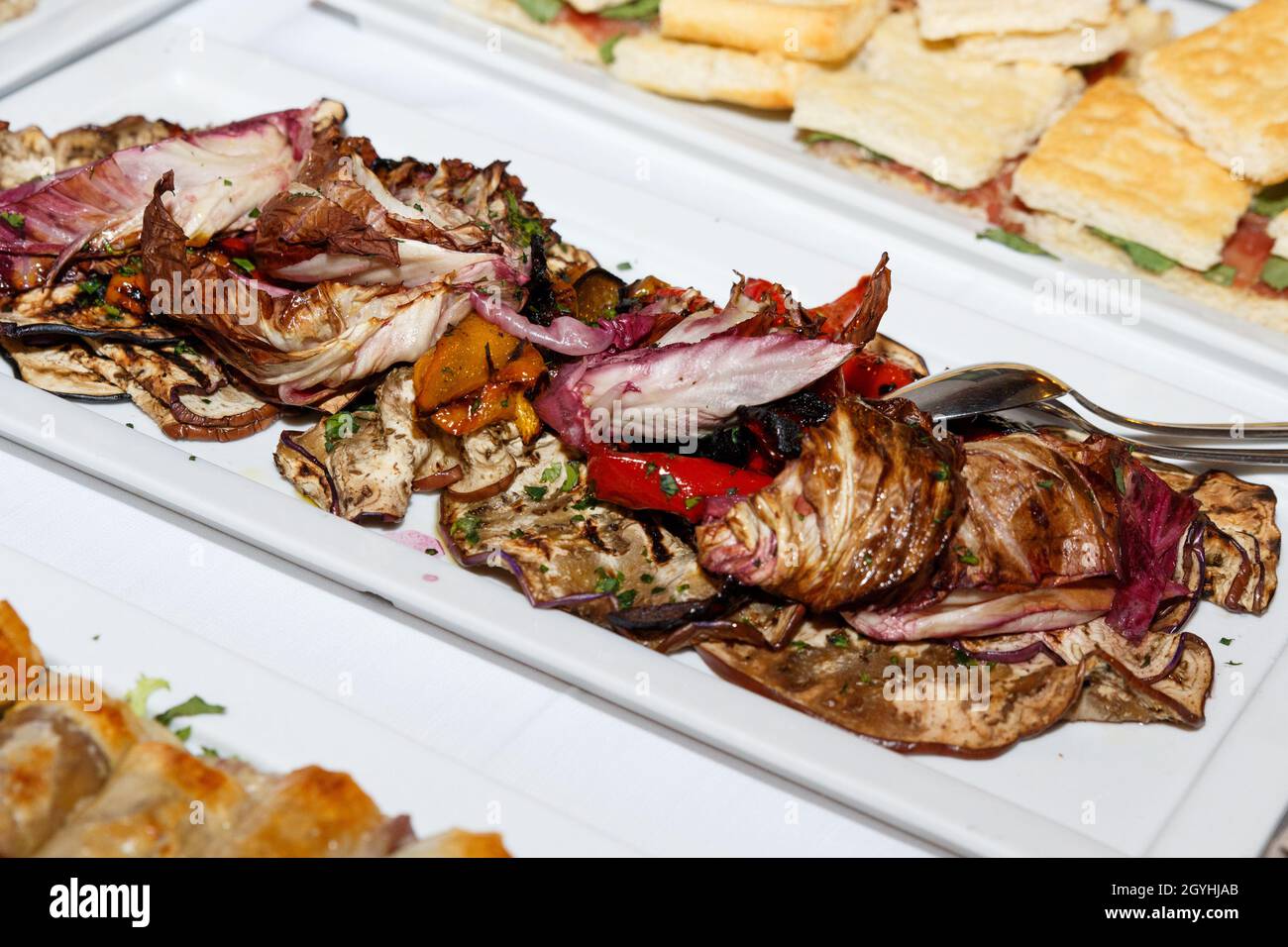 Traditional Apulean antipasti grilled vegetables during Italian wedding
