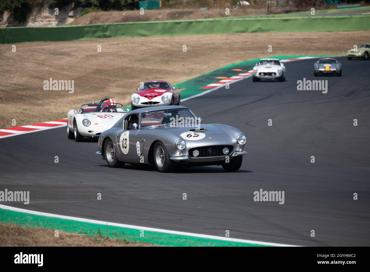 Italy, september 11 2021. Vallelunga classic. 60s vintage race car competition on racetrack, Ferrari 250 GT leading group Stock Photo