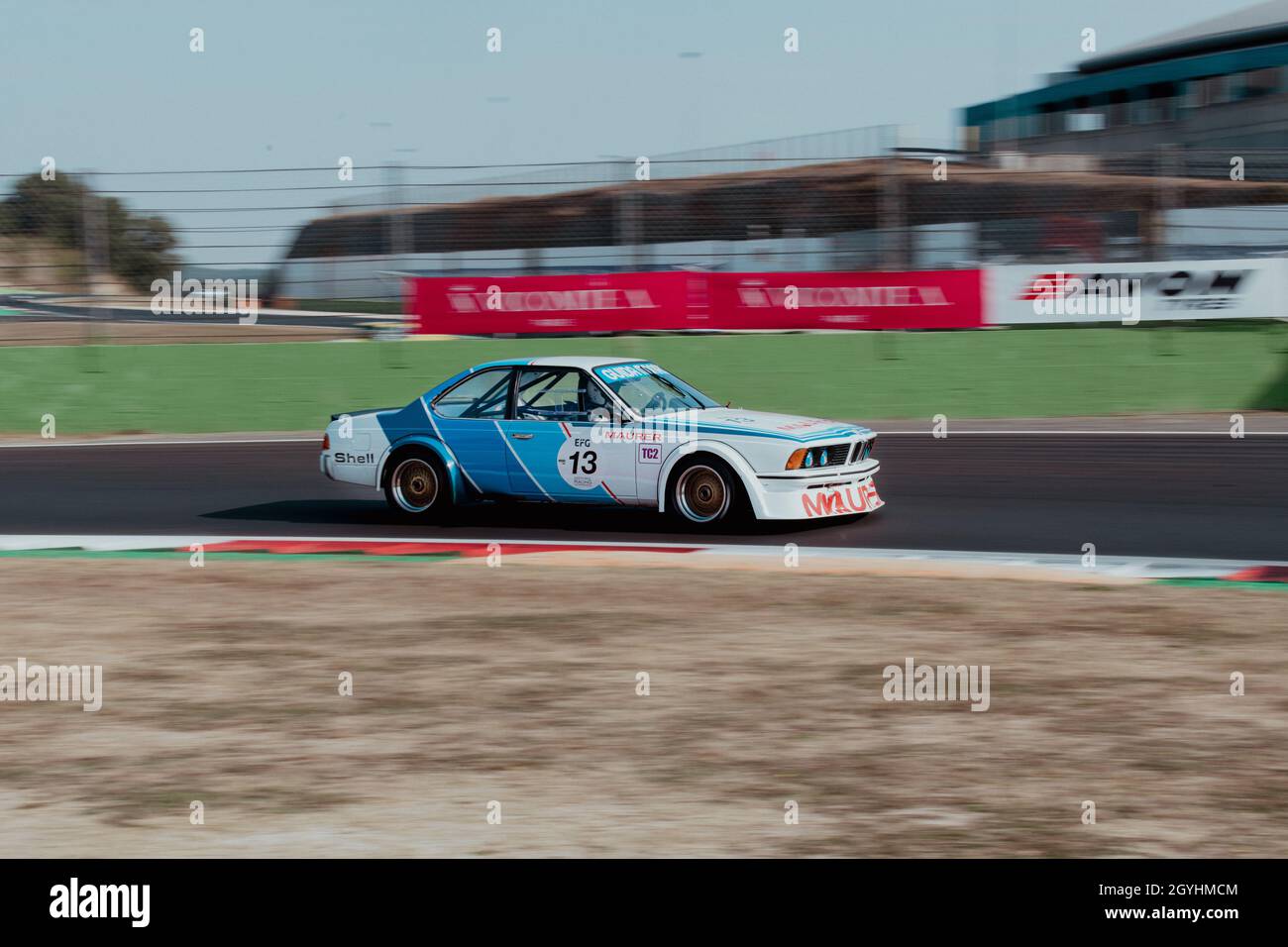 Italy, september 11 2021. Vallelunga classic. 70s vintage car racing blurred motion background of BMW 635CSI on asphalt racetrack Stock Photo