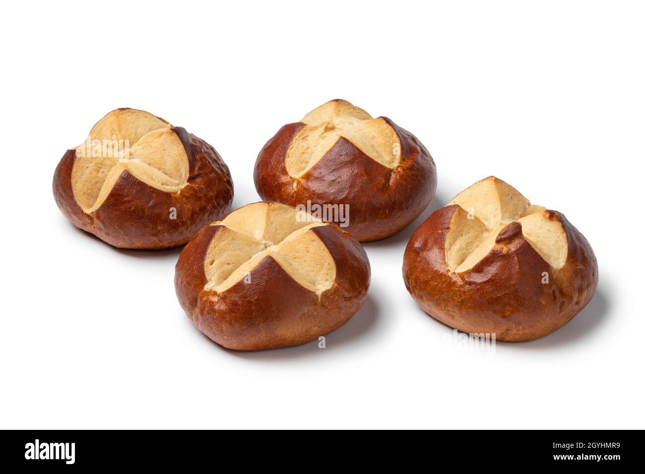 Fresh baked German Lye rolls isolated on white background Stock Photo