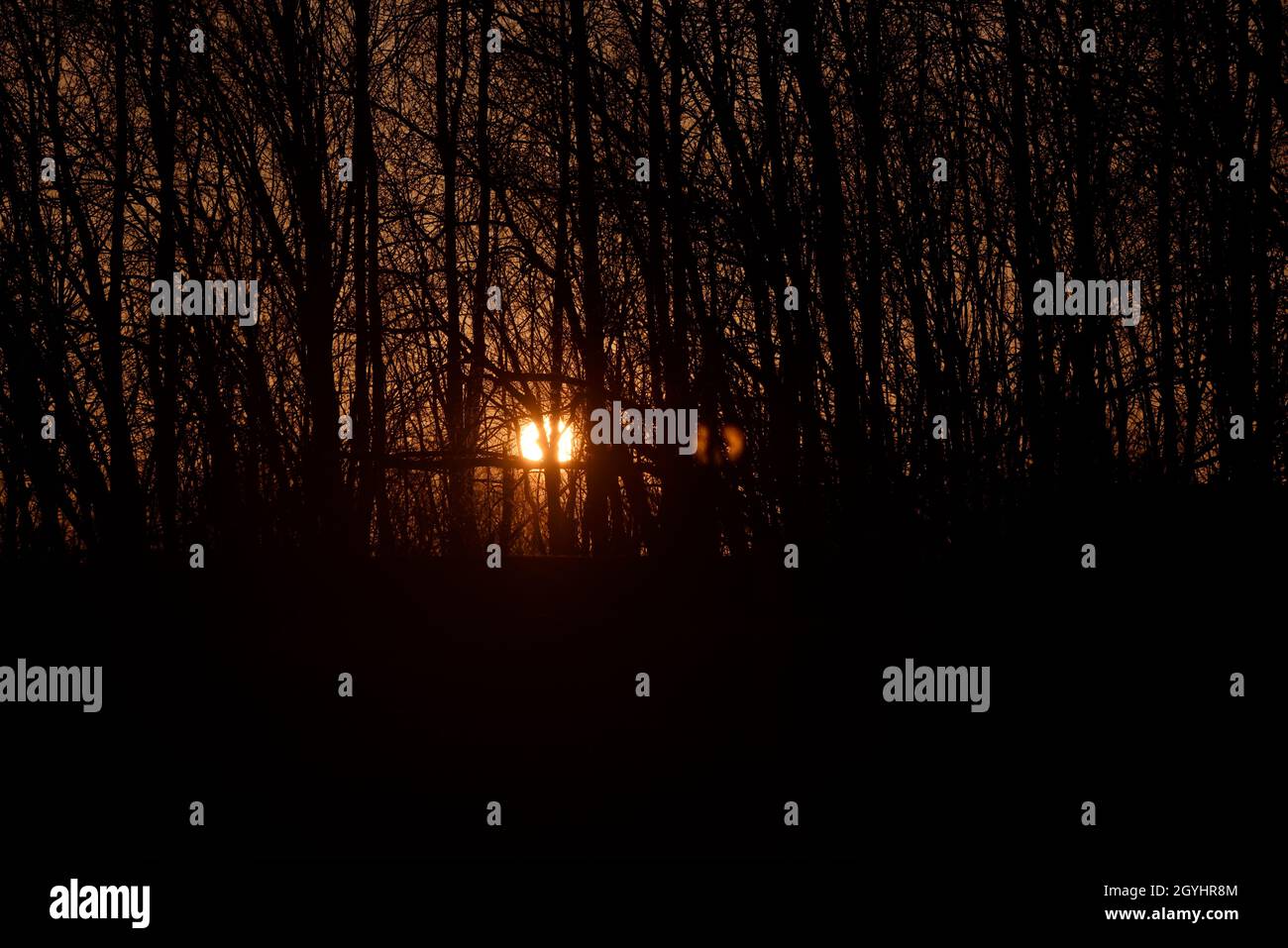 Sun shines through dark clouds hi-res stock photography and images - Alamy