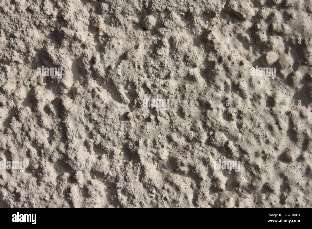 a light gray patterned wall Stock Photo