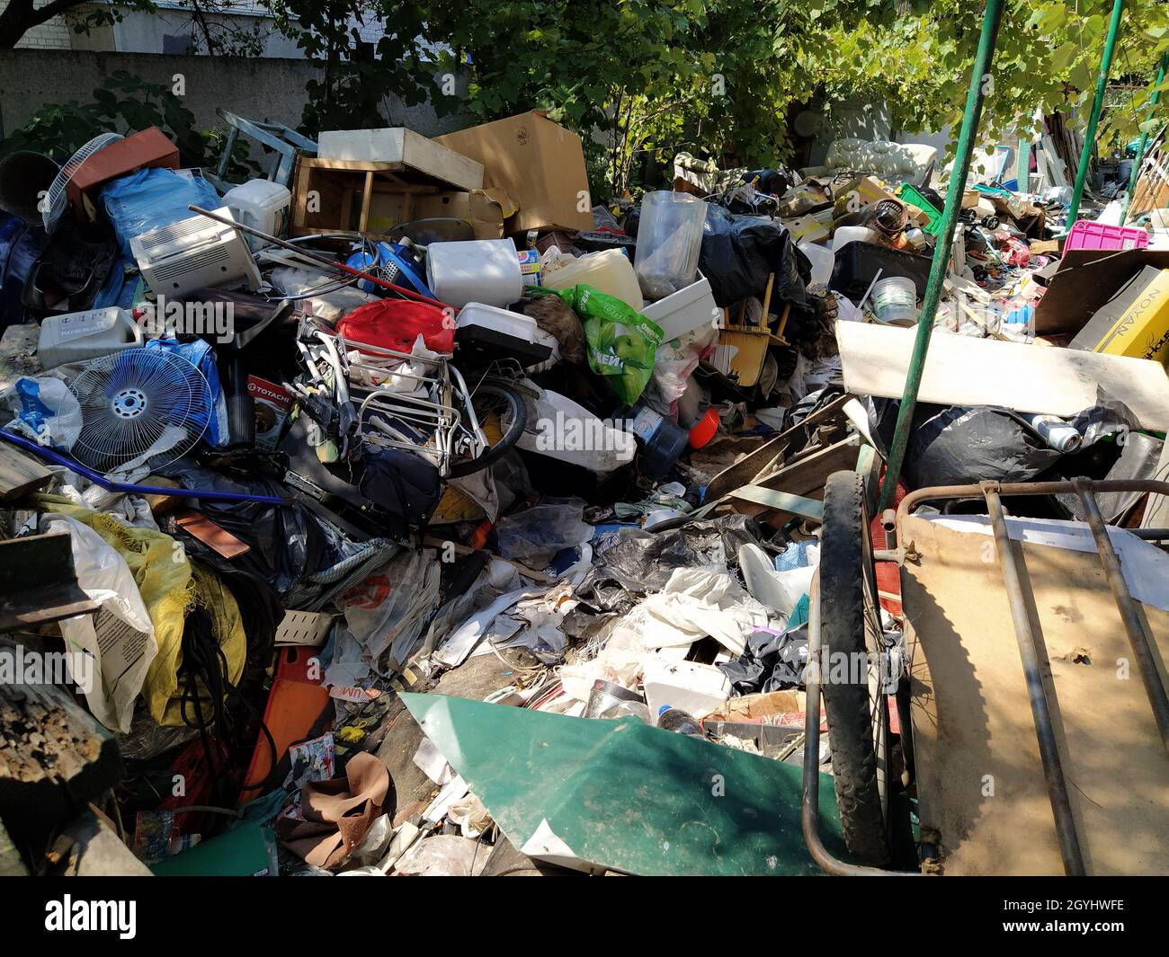 Abandoned yard full of rubbish Stock Photo