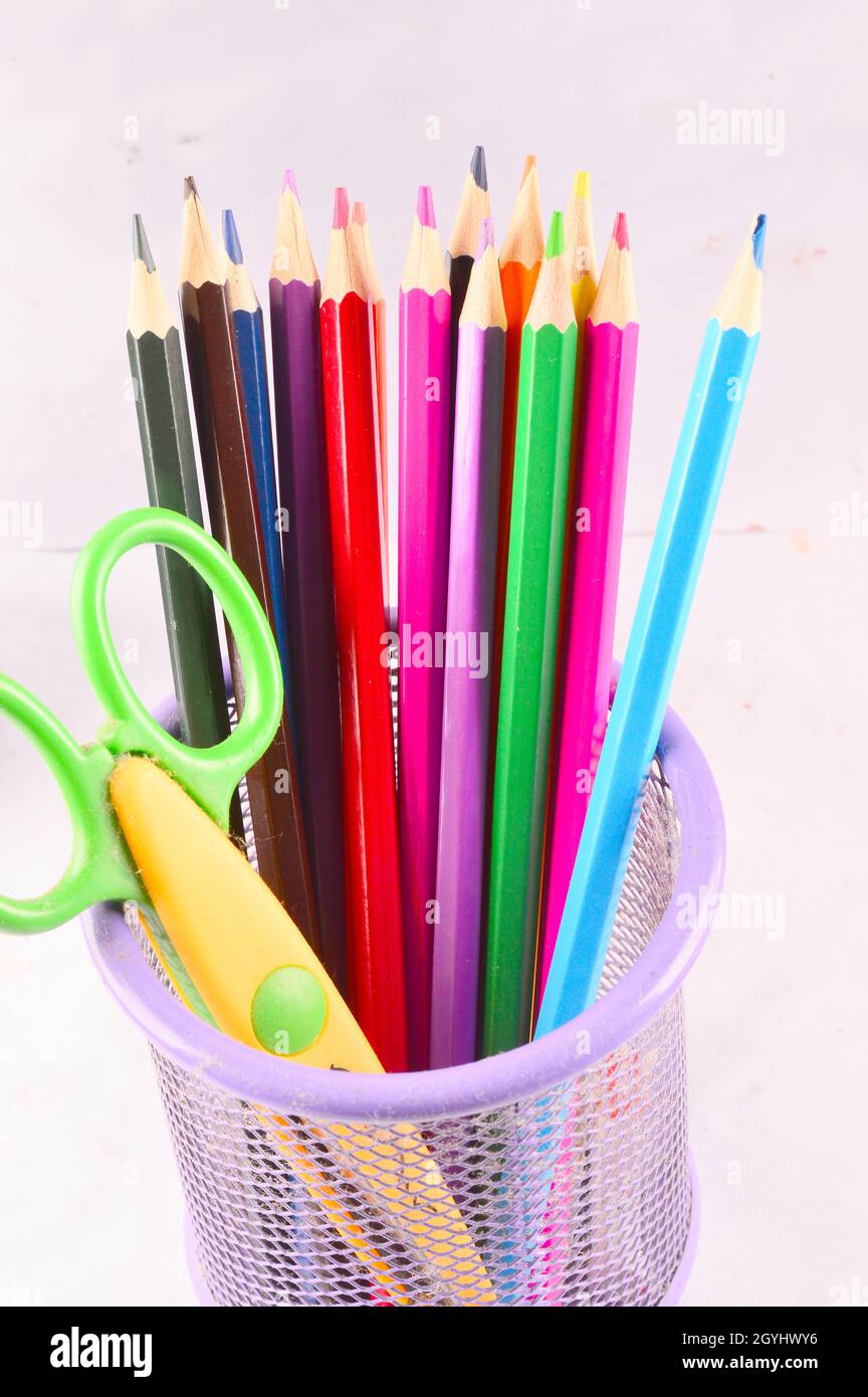Colored pencils lined up on white background Stock Photo Alamy