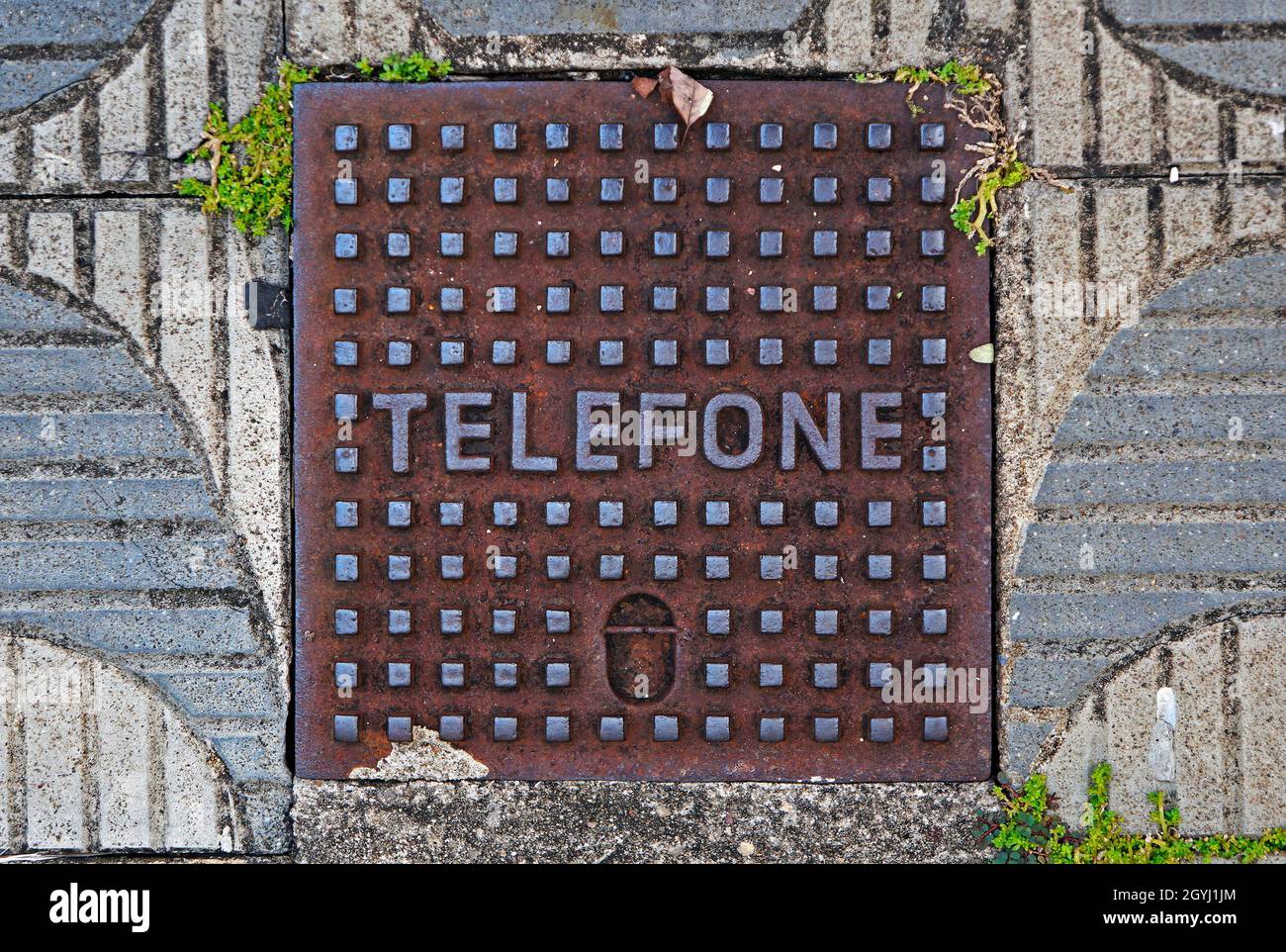 SAO JOAO DEL REI, MINAS GERAIS, BRAZIL - JANUARY 26, 2020: Telephone manhole cover on sidewalk Stock Photo