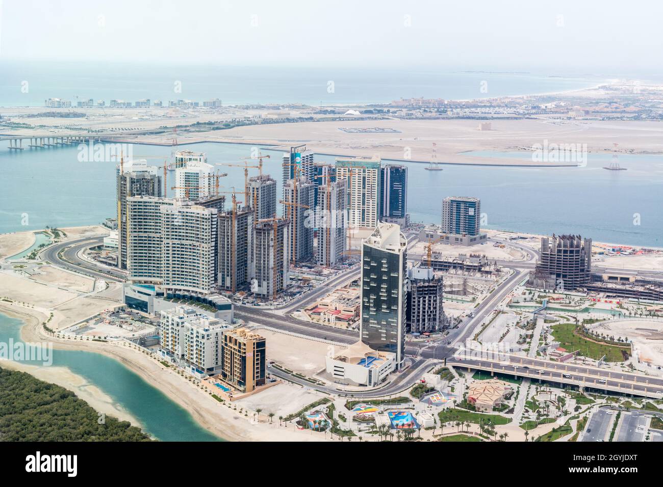 Aerial drone shot of Al Reem island buildings Gate towers, Sun and
