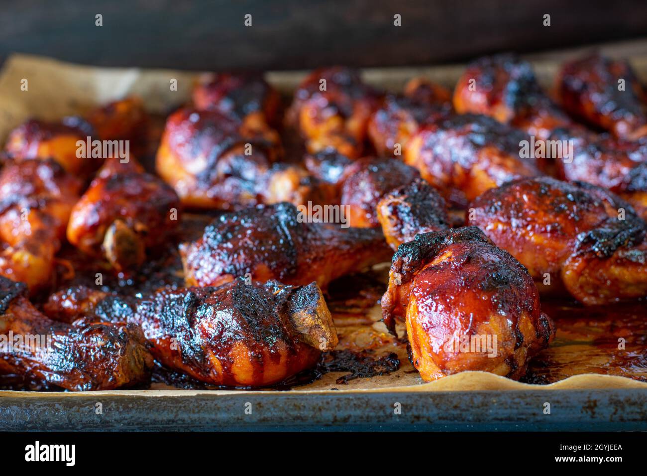 Oven baked chicken drumsticks marinated with barbecue and honey, Hot