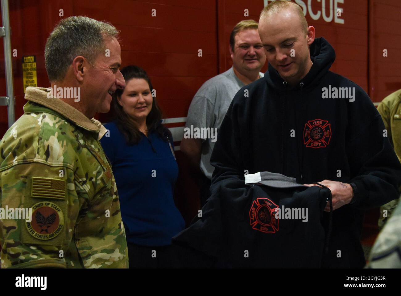Gen. David Goldfein, Chief of Staff of the Air Force, receives a token ...