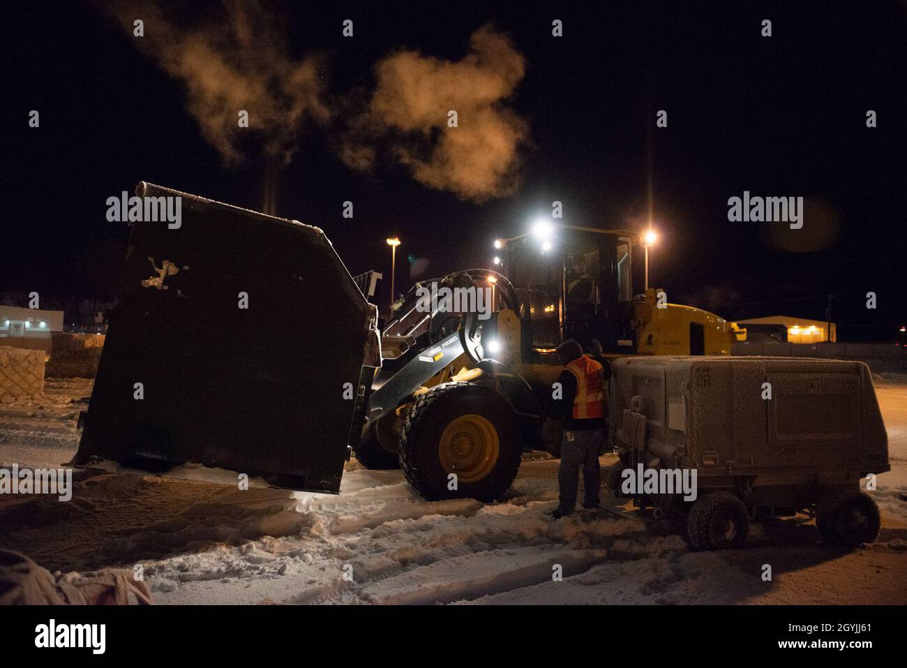 U.S. Airmen assigned to the 673d Logistics Readiness Group move ...