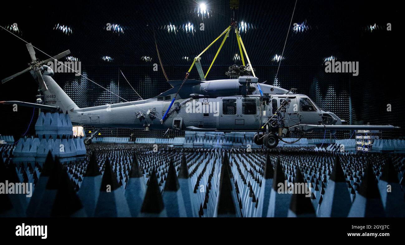 A 413th Flight Test Squadron HH-60W hangs in the anechoic chamber at the Joint Preflight Integration of Munitions and Electronic Systems hangar Jan. 6 at Eglin Air Force Base, Fla. The Whiskey entered the chamber for approximately seven weeks of defensive systems testing. The J-PRIMES anechoic chamber is a room designed to stop internal reflections of electromagnetic waves, as well as insulate from exterior sources of electromagnetic noise. J-PRIMES provides this environment to facilitate testing air-to-air and air-to-surface munitions and electronics systems on full-scale aircraft and land ve Stock Photo