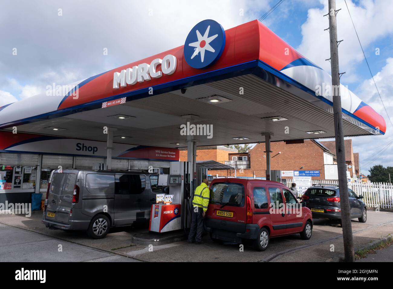 As the fuel crisis in the UK continues, this Murco petrol station is open for business and motorists drive in with their cars to fill up with fuel, which is being sold at normal prices on 29th September 2021 in Birmingham, United Kingdom. While some forecourts remain closed with little or no fuel, there is confusion amongst the public as to whether they should buy fuel now or wait. This has led to panic buying and long queues outside some petrol stations as the crisis, which has been caused by a lack of HGV drivers available to deliver supplies, continues. Stock Photo