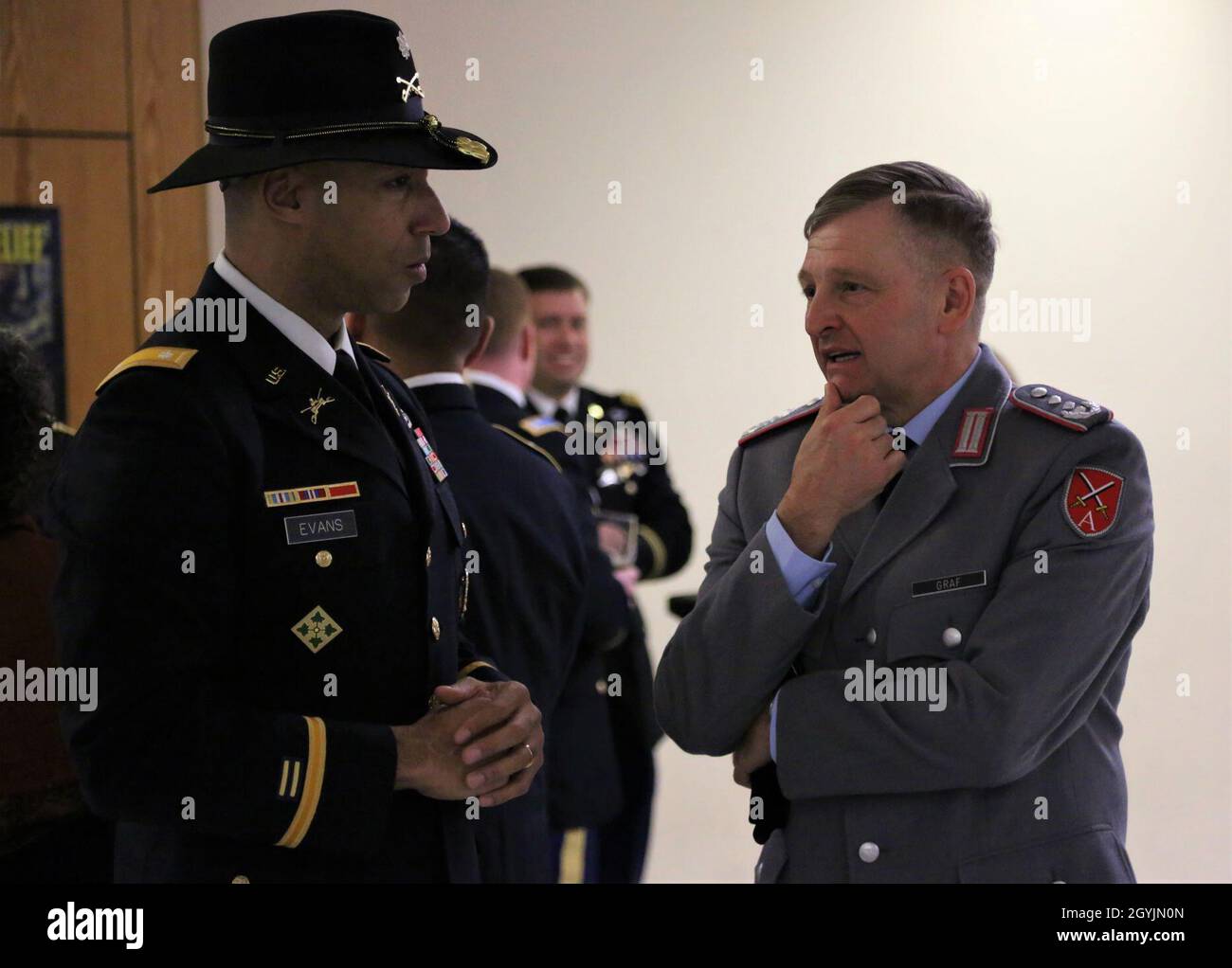 (Left to right)  Lt. Col. Johnny Evans and Col. Robert Graf of the Gefechtsuebungszentrum Heer converse at the Hohenfels Military Community New Year’s reception. Stock Photo