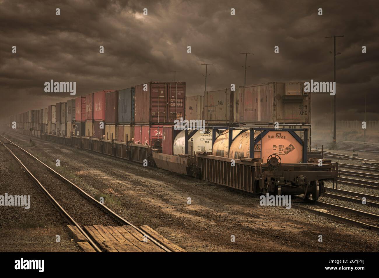 freight yard in Canada with intermodal container, spine car and shipping container. Stock Photo