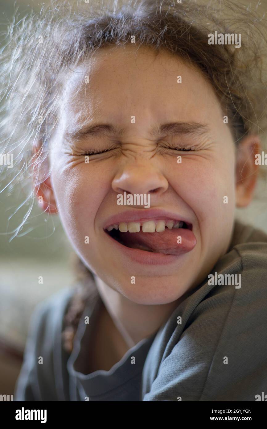 Fun portrait of girl making a funny face Stock Photo
